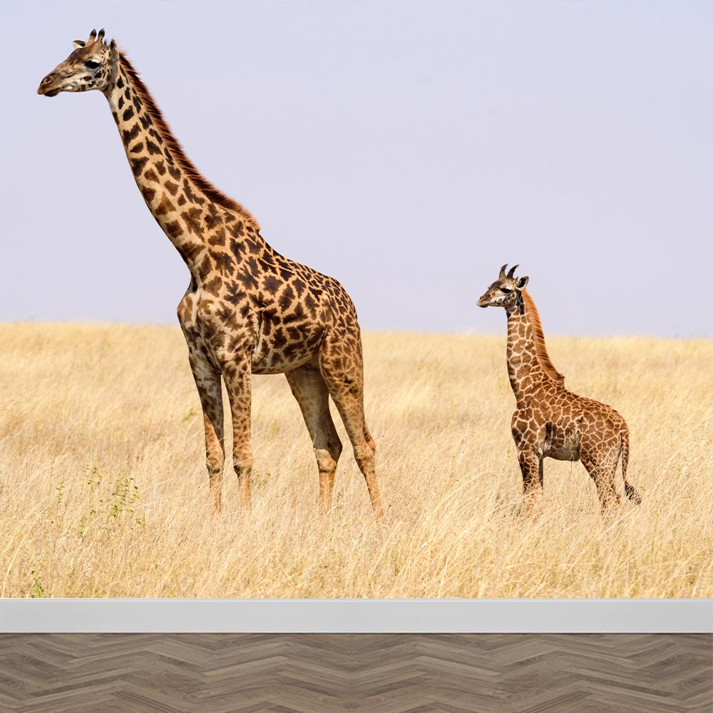 Fotobehang Giraf met jong in gras