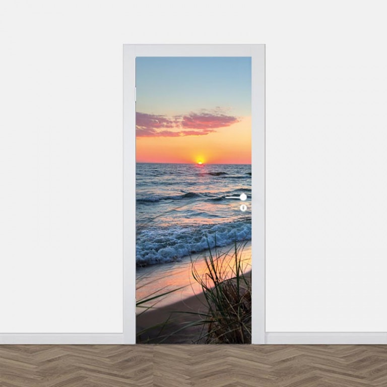 Deursticker Zonsondergang aan zee