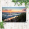 Tuinposter Zonsondergang aan zee