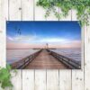 Tuinposter aan het water op de steiger