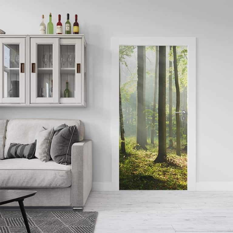 deursticker Zonsopgang in bos