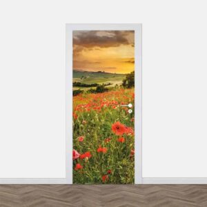 deursticker bloemenveld met zonsondergang