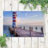 tuinposter vuurtoren aan steiger